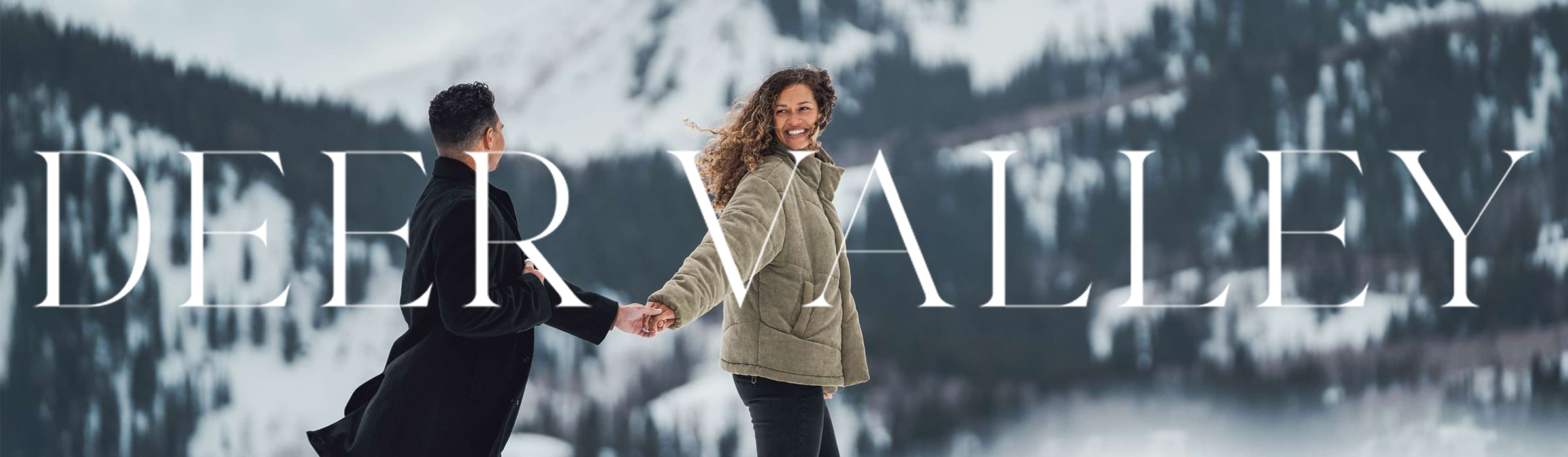 Couple holding hands at Deer Valley.